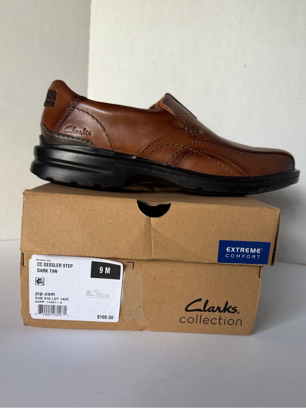 Clarks Men’s Dark Tan Leather Slip-On Loafer - Black Sole